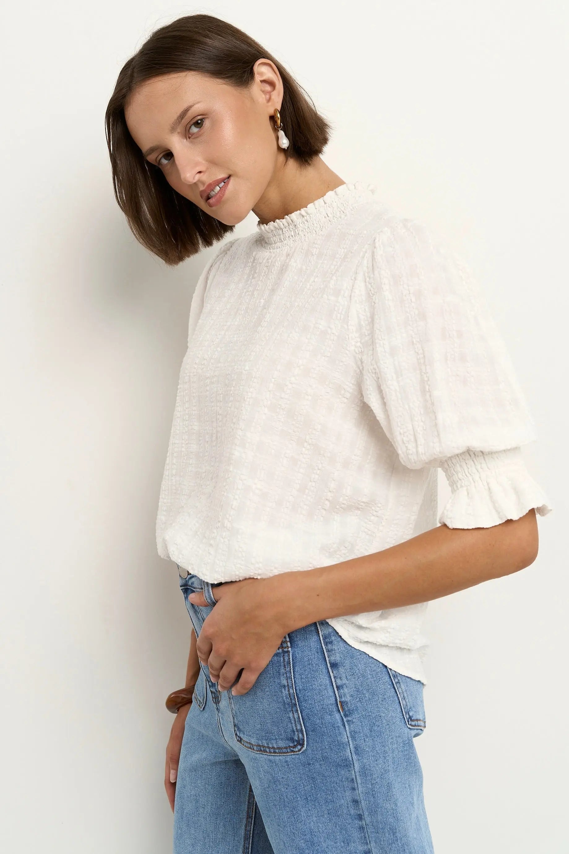 Influential High Neck Top Among the Brave